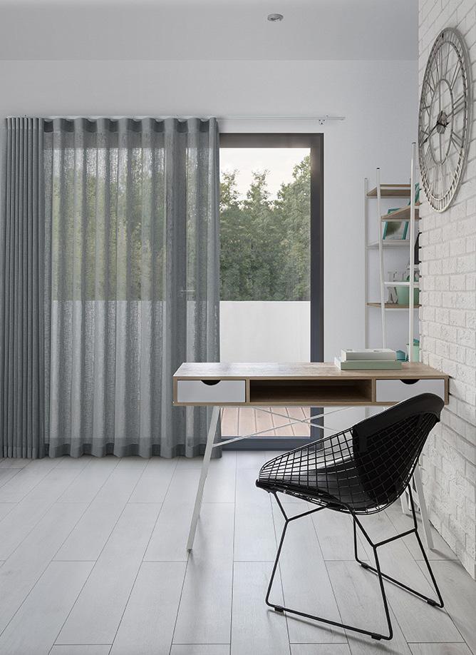 Sheer S-wave curtains in a bright bedroom.
